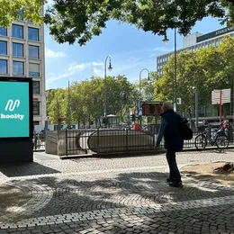 Hoolty digital screen near an office building