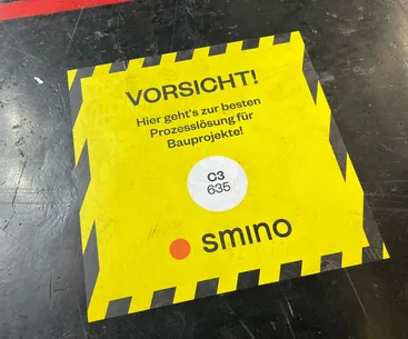 smino floor graphic inside the BAU 2025 venue